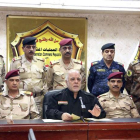 El primer ministro iraquí, en el centro, anuncia la ofensiva sobre la ciudad de Mosul. EFE
