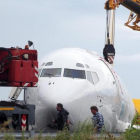 El avión de la carga de la compañía DHL accidentado.