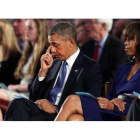 Obama, en el servicio religioso junto a su esposa, Michelle.