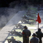 Una de las dieciocho patrullas que compitieron, ayer en el campo de tiro de la base militar Conde Gazola del Ferral. MARCIANO PÉREZ.