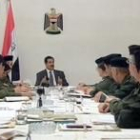 Imágenes de la televisión iraquí de la reunión que Husein celebró ayer con su gabinete, en Bagdad