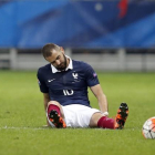 Benzema, tras sufrir una entrada en el amistoso de Francia ante Armenia, este jueves.