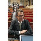 Mas, en el hemiciclo del Parlamento catalán.