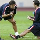 Morientes conserva con su compañero de equipo Giuly durante un entrenamiento