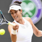 Muguruza golpea una derecha, durante su partido ante Kuznetsova.