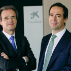 Jordi Gual, presidente de CaixaBank, y Gonzalo Gortázar, consejero delegado.