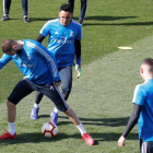Los jugadores del Madrid durante un entrenamiento de la pasada semana.