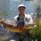 Truchas, dos comunes y dos arcoíris, pescadas en Pereje.