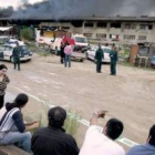 La Guardia Civil controla el asentamiento donde se produjo el incendio.