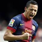 Alexis Sánchez celebra su gol, el primero del Barcelona ante el Getafe.