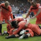 Los jugadores del Sevilla celebran el segundo tanto, conseguido por Jesús Navas