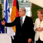 El primer ministro de Israel, Benjamin Netanyahu, junto a la canciller alemana, Angela Merkel.