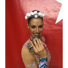 Carolina Rodríguez muerde sus cinco medallas de oro