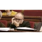Joan Saura, Carod Rovira y José Montilla, ayer durante el pleno de la Generalitat