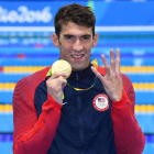 El estadounidense Michael Phelps celebra el vigésimo segundo oro de su carrera. FOSTER