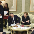Vladimir Putin, François Hollande, Angela Merkel y Petró Poroshenko, durante las negociaciones en Minsk.