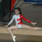 Amanda González, en una de sus actuaciones en barra fija, fue medalla de bronce en asimétricas.