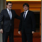 Mariano Rajoy (izquierda) y Carles Puigdemont, el pasado mes de abril.