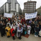 Manifestantes por las calles de León.