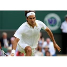 Federer devuelve la pelota en un momento del partido de hoy