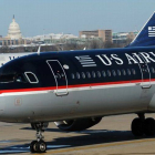 Un avión de US Airways, una de las primeras aerolíneas en anunciar la suspensión de sus vuelos a Tel-Aviv.