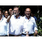 El jefe del PP provincial de Pontevedra Rafael Louzán (derecha), junto a Rajoy y Feijóo, en agosto del 2013.