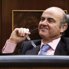 De Guindos, en el pleno del Congreso que convalidó en mayo la segunda reforma financiera.