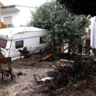 Vista ayer de una de las calles afectadas por la riada en Villanueva del Trabuco, Málaga.