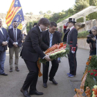 Carles Puigdemont durante la ofrenda floral en recuerdo a Lluis Companys. ANDREU DALMAU
