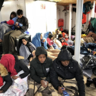 Inmigrantes y refugiados rescatados por Proactiva Open Arms la noche del 25 de diciembre.