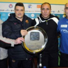Los cuatro técnicos sostienen la Copa Asobal que se disputa: Ribera, Pascual, Dujshebaev y Pastor.