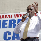 Herman Cain.