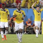 Los jugadores de Colombia festejan el pase a octavos de final como primeros de grupo.