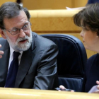 Mariano Rajoy y Soraya Sáenz de Santamaría, en el Senado.