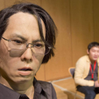 La réplica humanoide del profesor Hiroshi Ishiguro imparte una conferencia magistral en Salamanca. En la imagen junto a su ayudante Kohei Ogawa.