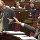 Artur Mas avisa a Jordi Pujol de que finaliza su turno de intervención en el Parlamento catalán