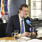 El presidente Mariano Rajoy, durante una entrevista en una cadena de radio.