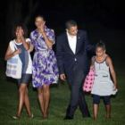 Barack Obama, junto a su esposa y sus dos hijas, Malia y Sasha