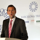 El presidente del PP, Mariano Rajoy, durante su intervención hoy en la comida-coloquio Barcelona Tribuna.