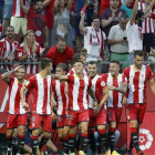 Los jugadores del Girona celebran el primer gol del equipo en Primera División