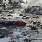 El cadáver de una víctima de la explosión de un coche bomba en el centro de Damasco.