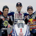 Elías (Moto2), Jorge Lorenzo (MotoGP) y Márquez (125) han logrado para España un hito histórico