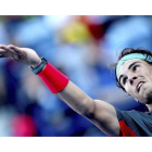 Los tenistas españoles, David Ferrer y Rafa Nadal, durante su intenso partido.