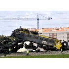 La máquina del tren de mercancías se montó literalmente encima del mercancías que estaba parado.