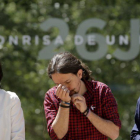 Carolina Bescansa, Pablo Iglesias e Íñigo Errejón, durante un acto de Podemos.