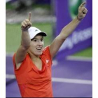 Henin festeja su trabajada victoria ante la rusa Sharapova