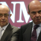 Montoro y De Guindos, en el acto de la CNMV.