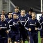 Helguera, en primer término, tendrá que ver el partido desde la grada