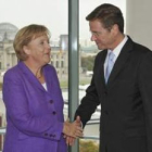 Angela Merkel y Guido Westerwelle, en la reunión que mantuvieron tras las elecciones.
