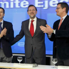 Núñez Feijóo, Rajoy y Basagoiti, en una imagen de archivo durante un acto del PP en Génova.